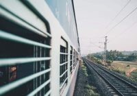 A twenty-four-year-old boy looks out of a moving train and screams loudly