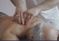 Old man was getting a massage from the masseur