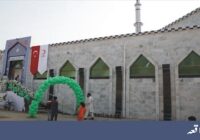 A Turkish Muslim stands in the compound of Nabvi Sharif Mosque and narrates the incident