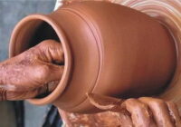 The potter was making something out of clay